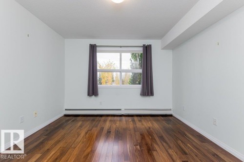 208 8802 Southfort Drive, Fort Saskatchewan, AB - Indoor Photo Showing Other Room