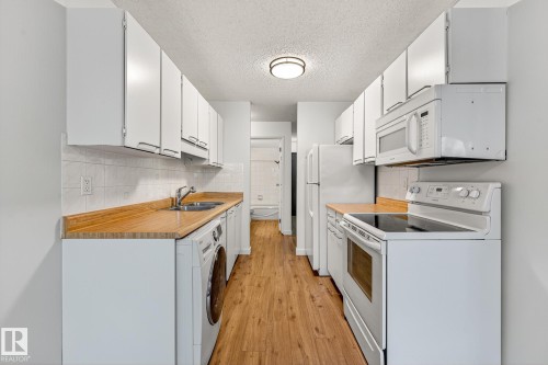 204 10829 117 Street, Edmonton, AB - Indoor Photo Showing Kitchen With Double Sink