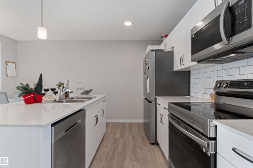 82 1816 Rutherford Road, Edmonton, AB - Indoor Photo Showing Kitchen With Double Sink