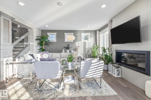 4210 Veterans Way, Edmonton, AB - Indoor Photo Showing Living Room With Fireplace