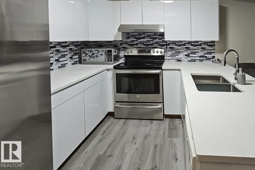 5531 163 Avenue, Edmonton, AB - Indoor Photo Showing Kitchen With Double Sink