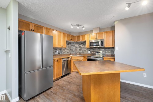 421 5350 199 Street, Edmonton, AB - Indoor Photo Showing Kitchen With Stainless Steel Kitchen