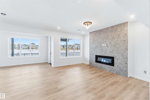 72 Eldridge Point(E), St. Albert, AB - Indoor Photo Showing Living Room With Fireplace