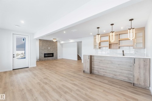 72 Eldridge Point(E), St. Albert, AB - Indoor Photo Showing Other Room With Fireplace