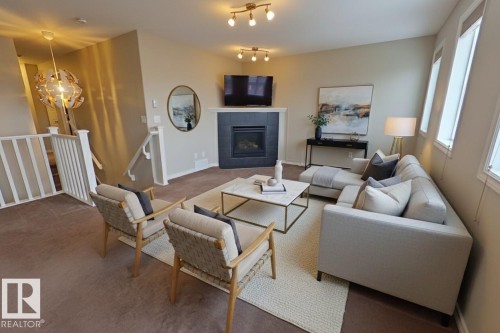 1117 59A Street, Edmonton, AB - Indoor Photo Showing Living Room With Fireplace