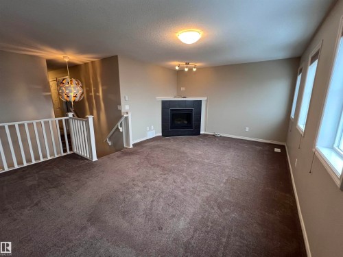 1117 59A Street, Edmonton, AB - Indoor Photo Showing Other Room With Fireplace
