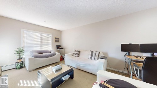313 636 Mcallister Loop, Edmonton, AB - Indoor Photo Showing Living Room