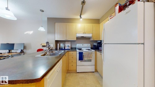 313 636 Mcallister Loop, Edmonton, AB - Indoor Photo Showing Kitchen With Double Sink