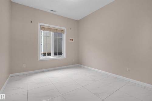 105 160 Magrath Road Nw, Edmonton, AB - Indoor Photo Showing Other Room
