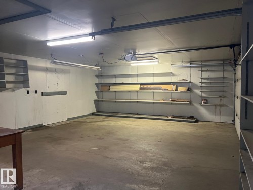 7112 99 Avenue, Edmonton, AB - Indoor Photo Showing Garage