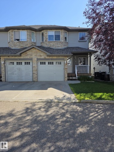 11 6304 Sandin Way, Edmonton, AB - Outdoor With Facade