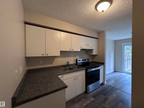3313 138 Avenue, Edmonton, AB - Indoor Photo Showing Kitchen With Double Sink