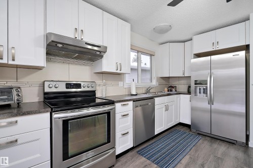 4317 44 Street, Beaumont, AB - Indoor Photo Showing Kitchen With Double Sink With Upgraded Kitchen