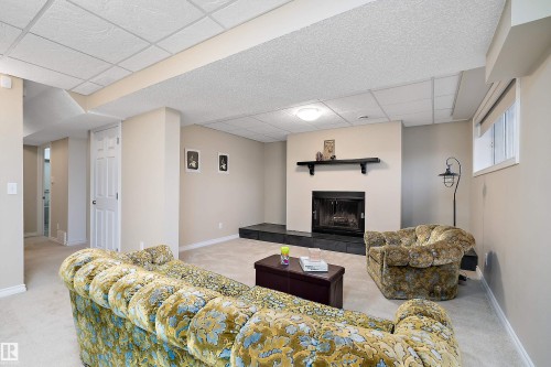 4317 44 Street, Beaumont, AB - Indoor Photo Showing Basement With Fireplace
