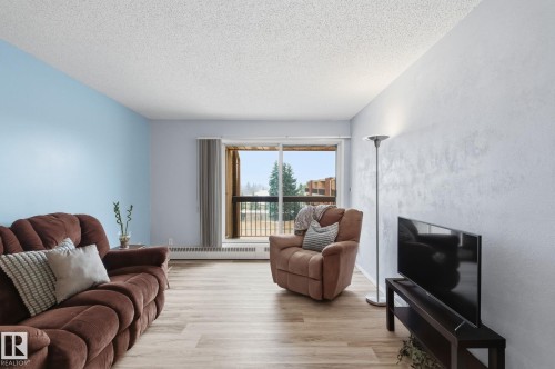 408 10511 19 Avenue, Edmonton, AB - Indoor Photo Showing Living Room