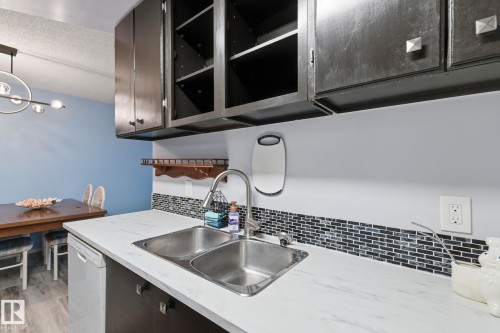 408 10511 19 Avenue, Edmonton, AB - Indoor Photo Showing Kitchen With Double Sink