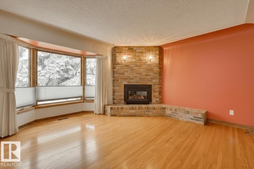9725 143 Street, Edmonton, AB - Indoor Photo Showing Living Room With Fireplace