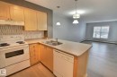 416 616 Mcallister Loop, Edmonton, AB  - Indoor Photo Showing Kitchen With Double Sink 