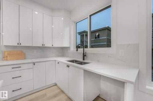 3518 42 Ave Avenue, Beaumont, AB - Indoor Photo Showing Kitchen With Double Sink