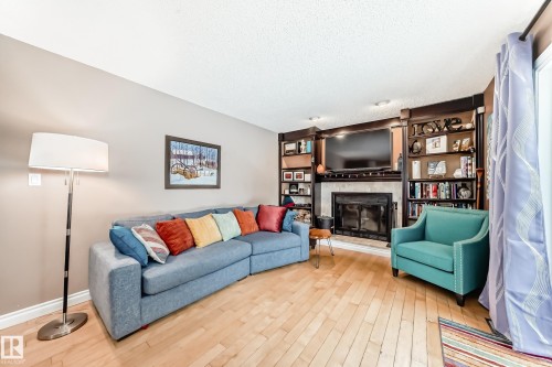 318 Dechene Road, Edmonton, AB - Indoor Photo Showing Living Room With Fireplace