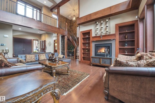 148 Windermere Crescent, Edmonton, AB - Indoor Photo Showing Living Room With Fireplace