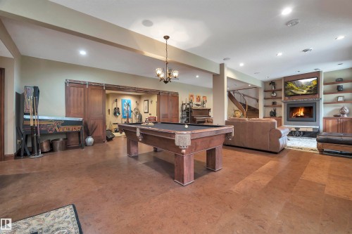 148 Windermere Crescent, Edmonton, AB - Indoor Photo Showing Other Room With Fireplace
