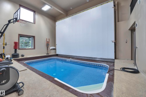 148 Windermere Crescent, Edmonton, AB - Indoor Photo Showing Other Room With In Ground Pool