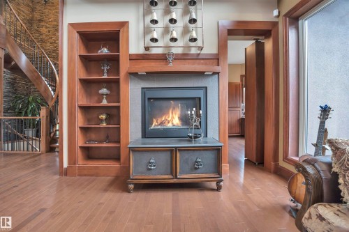 148 Windermere Crescent, Edmonton, AB - Indoor Photo Showing Living Room With Fireplace