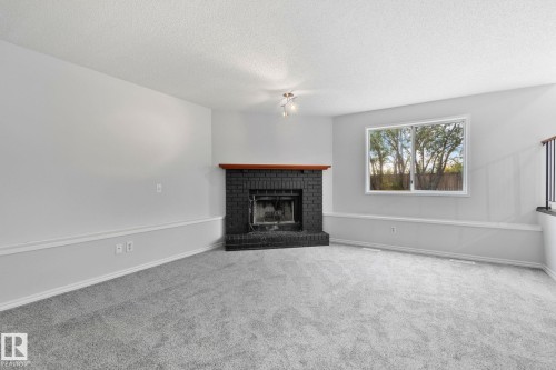 6016 189 Street, Edmonton, AB - Indoor Photo Showing Living Room With Fireplace