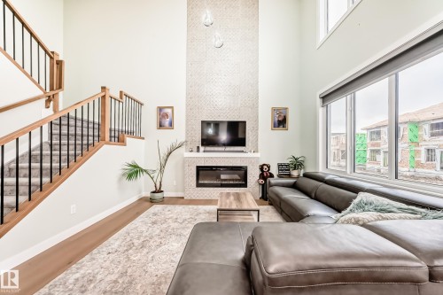 3621 41 Avenue, Beaumont, AB - Indoor Photo Showing Living Room With Fireplace