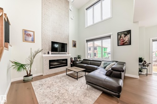 3621 41 Avenue, Beaumont, AB - Indoor Photo Showing Living Room With Fireplace