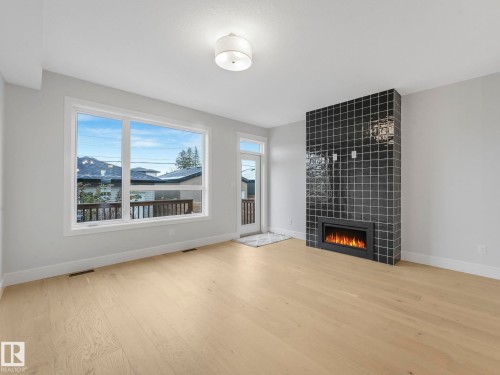 9311 152 Street, Edmonton, AB - Indoor Photo Showing Living Room With Fireplace