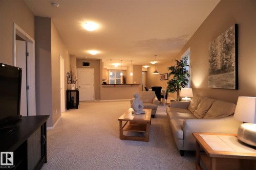 200 9940 Sherridon Drive, Fort Saskatchewan, AB - Indoor Photo Showing Living Room