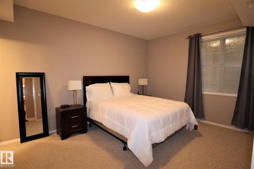 200 9940 Sherridon Drive, Fort Saskatchewan, AB - Indoor Photo Showing Bedroom