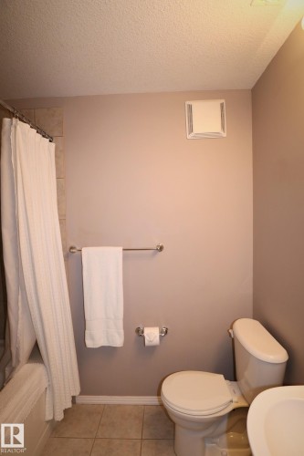 200 9940 Sherridon Drive, Fort Saskatchewan, AB - Indoor Photo Showing Bathroom