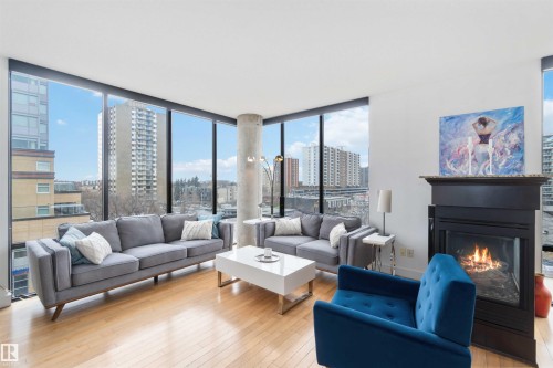 504 10028 119 Street, Edmonton, AB - Indoor Photo Showing Living Room With Fireplace
