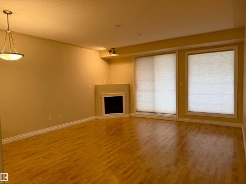 118 7801 Golf Course Road, Stony Plain, AB - Indoor With Fireplace