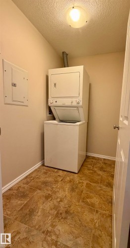 118 7801 Golf Course Road, Stony Plain, AB - Indoor Photo Showing Laundry Room