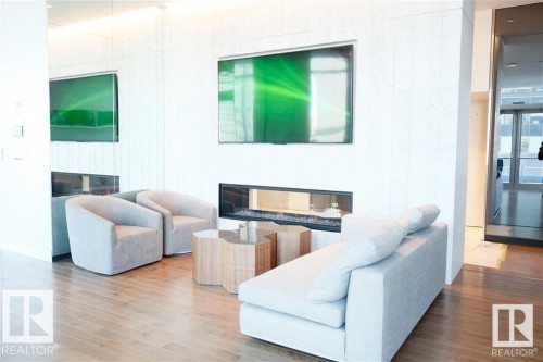 3307 10360 102 Street, Edmonton, AB - Indoor Photo Showing Other Room With Fireplace