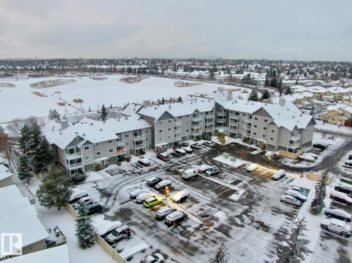 Snowy aerial view with a residential view - 213 5065 31 Avenue, Edmonton, AB - Outdoor With View
