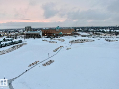 Snowy aerial view featuring a view of city - 213 5065 31 Avenue, Edmonton, AB - Outdoor With View