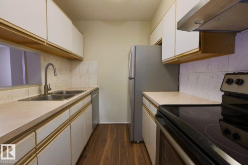 213 5065 31 Avenue, Edmonton, AB - Indoor Photo Showing Kitchen With Double Sink