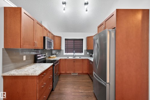 3327 Weidle Way, Edmonton, AB - Indoor Photo Showing Kitchen With Double Sink
