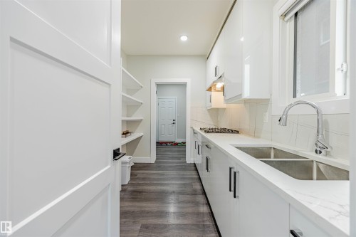 9007 181 Avenue, Edmonton, AB - Indoor Photo Showing Kitchen With Double Sink