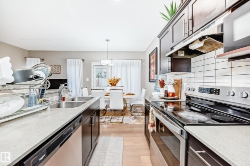 246 Hawks Ridge Boulevard, Edmonton, AB - Indoor Photo Showing Kitchen With Stainless Steel Kitchen With Double Sink With Upgraded Kitchen