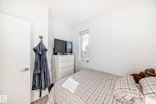 Bedroom with carpet flooring - 14812 98 Avenue, Edmonton, AB - Indoor Photo Showing Bedroom