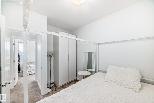 Carpeted bedroom with baseboards - 14812 98 Avenue, Edmonton, AB - Indoor Photo Showing Bedroom
