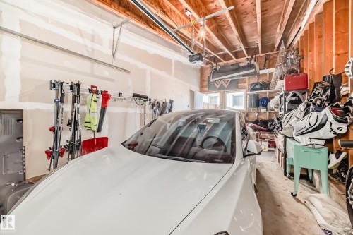 Garage featuring a garage door opener - 14812 98 Avenue, Edmonton, AB - Indoor