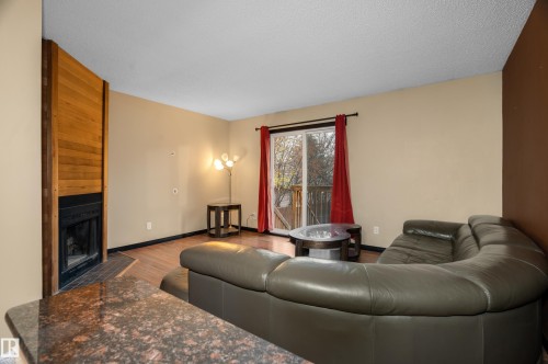 3511 43 Avenue, Edmonton, AB - Indoor Photo Showing Living Room With Fireplace