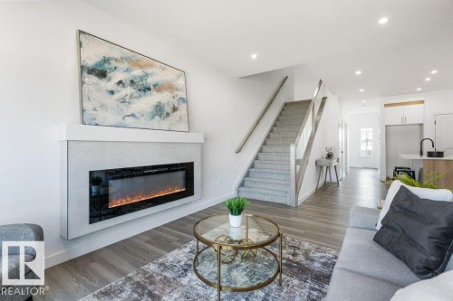 9824 106 Avenue, Morinville, AB - Indoor Photo Showing Living Room With Fireplace
